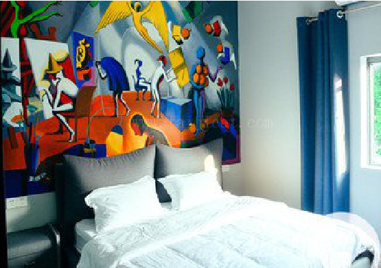 富宁对于酒店的墙体彩绘而言更注重哪些方面？